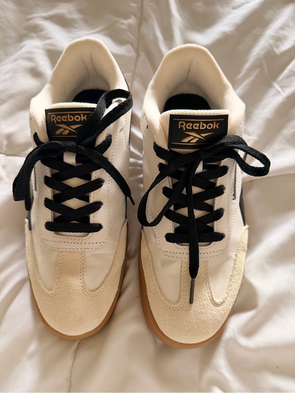 Reebok women’s White, Black & Gum Low-Top Sneakers